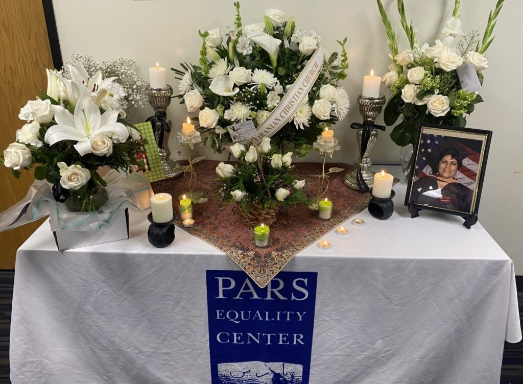 A table with flowers and candles on it